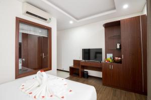 TV o dispositivi per l'intrattenimento presso Dao Ngoc Hotel Da Nang