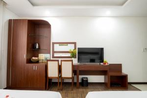 TV o dispositivi per l'intrattenimento presso Dao Ngoc Hotel Da Nang