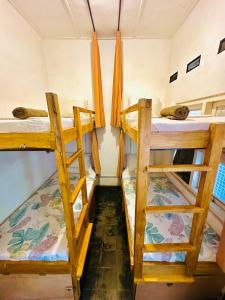 Postel nebo postele na pokoji v ubytování Ijen Backpacker