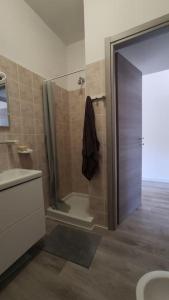 a bathroom with a shower and a sink at Casa BLU B7 4 in La Maddalena +36 photos