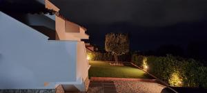 A garden outside Villa NOVE - Residence dei Fiori