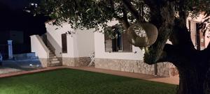 A garden outside Villa NOVE - Residence dei Fiori