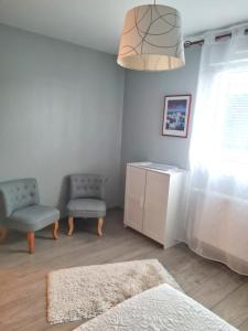 Posezení v ubytování La Maison De Roméo