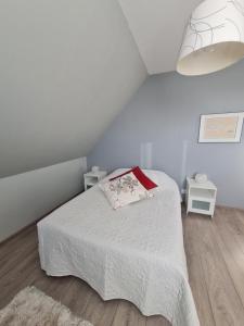 Postel nebo postele na pokoji v ubytování La Maison De Roméo