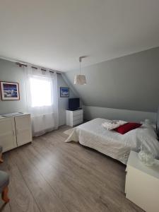 Postel nebo postele na pokoji v ubytování La Maison De Roméo