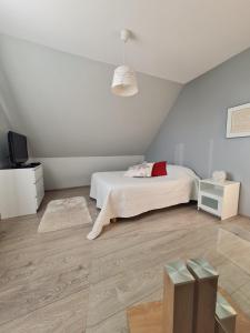 Postel nebo postele na pokoji v ubytování La Maison De Roméo