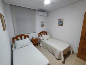 Posteľ alebo postele v izbe v ubytovaní Mi casita