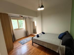 Postel nebo postele na pokoji v ubytování Luxury 3BR in the heart of Mohandseen