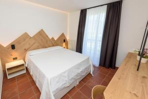 Agritur La Pieve客房内的一张或多张床位