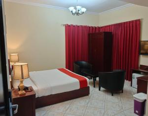 Postel nebo postele na pokoji v ubytování Ruwi Beach Hotel Apartments - MAHA HOSPITALITY GROUP