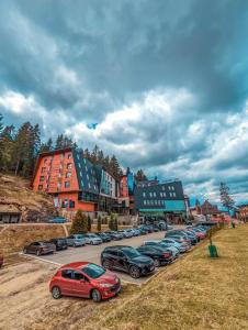 a group of cars parked in a parking lot at Hotel Blanca Resort & Spa in Vlasic