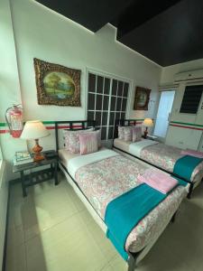 Postel nebo postele na pokoji v ubytování Italy Condotel Darasa