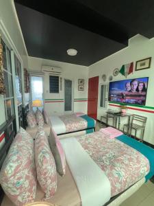 Postel nebo postele na pokoji v ubytování Italy Condotel Darasa