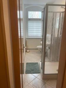 Ένα μπάνιο στο Ferienwohnung 3S Real Estate
