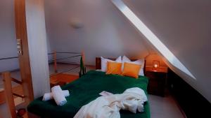 Posteľ alebo postele v izbe v ubytovaní Apartament Pod 12 B