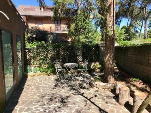 Сад в Loft con giardino in zona Appia Antica