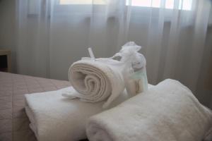 Postel nebo postele na pokoji v ubytování Hotel Dei Tartari
