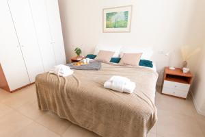 A bed or beds in a room at [Luxury apartment near Duomo] Italia 38