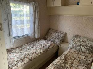 Postel nebo postele na pokoji v ubytování Dolina Trzech Stawów
