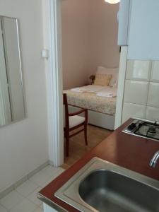 Posteľ alebo postele v izbe v ubytovaní Apartman Orgona