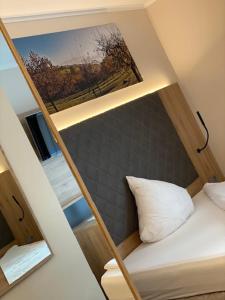 Postel nebo postele na pokoji v ubytování Hotel Restaurant Roemer