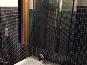 a bathroom with a sink and a mirror at Appartement Montgenèvre, 3 pièces, 4 personnes - FR-1-445-28 in Montgenèvre