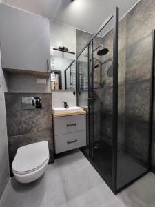 Ένα μπάνιο στο Handy Apartamenty - Mieszkania na Doby w Centrum Rzeszowa