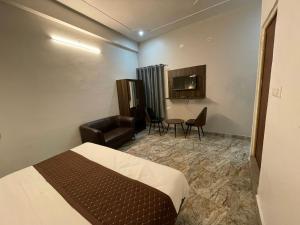 Postel nebo postele na pokoji v ubytování Hotel Sangam View