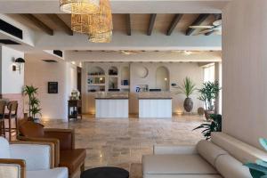 a lobby of a hotel with a waiting room at Radisson Blu Hotel, Kas in Kaş