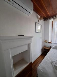 Postel nebo postele na pokoji v ubytování Xinovrissi Apts & Pool