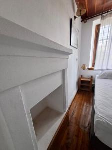 Postel nebo postele na pokoji v ubytování Xinovrissi Apts & Pool