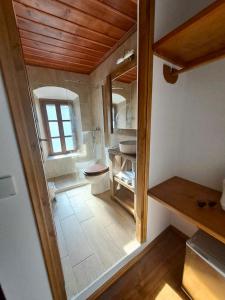Postel nebo postele na pokoji v ubytování Xinovrissi Apts & Pool