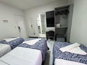 Postel nebo postele na pokoji v ubytování Ritz Praia Hotel