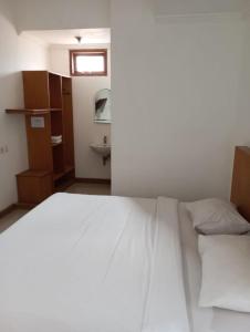 Ein Bett oder Betten in einem Zimmer der Unterkunft Amelle Villas & Residences Canggu