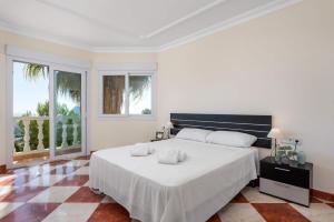 Posteľ alebo postele v izbe v ubytovaní Villa Ros - PlusHolidays