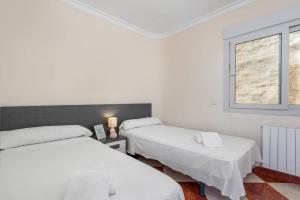 Posteľ alebo postele v izbe v ubytovaní Villa Ros - PlusHolidays