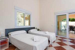 Posteľ alebo postele v izbe v ubytovaní Villa Ros - PlusHolidays