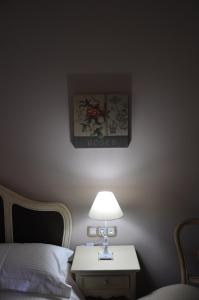 Postel nebo postele na pokoji v ubytování Thisoa Hotel