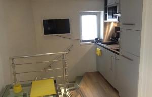 Dapur atau dapur kecil di Studio climatisé indépendant plein cœur de Lyon