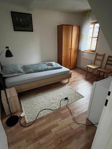 Postel nebo postele na pokoji v ubytování Apartments Gala Abertamy