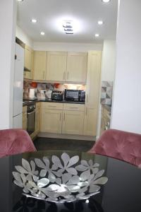 Virtuvė arba virtuvėlė apgyvendinimo įstaigoje Urban Oasis: North London