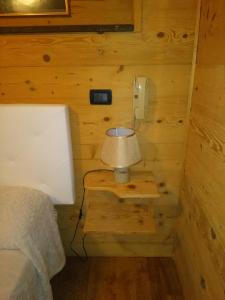 Postelja oz. postelje v sobi nastanitve Albergo Martinet