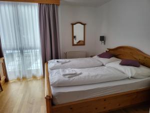Letto o letti in una camera di Gasthof Ramona