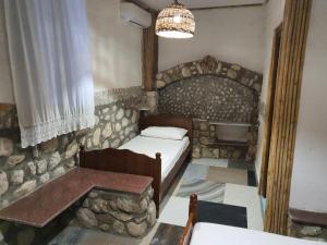 Maxola's Dream Orikum客房内的一张或多张床位