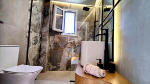 A bathroom at Aelia Apartments Még 35 kép
