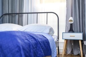 Posteľ alebo postele v izbe v ubytovaní River House - J&D Apartamenty