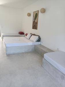 Watamu Ascot Resort客房内的一张或多张床位