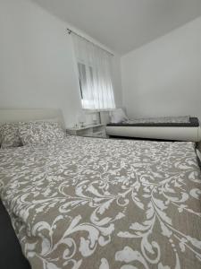 Postel nebo postele na pokoji v ubytování Apartment Vlora-Naturblick