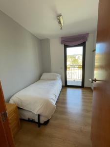 Postel nebo postele na pokoji v ubytování Niu Turistic Olvan