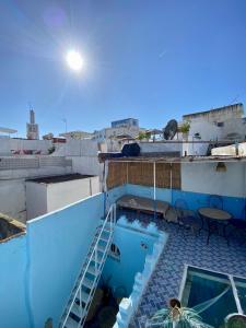 a swimming pool on the roof of a building at Dar Coeur De Tanger - Riad Privé avec terrasse in Tangier